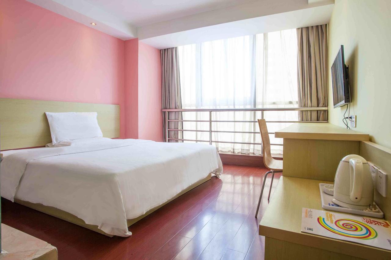 7 Days Inn Yangjiang Xinyue International Studio Kamer foto