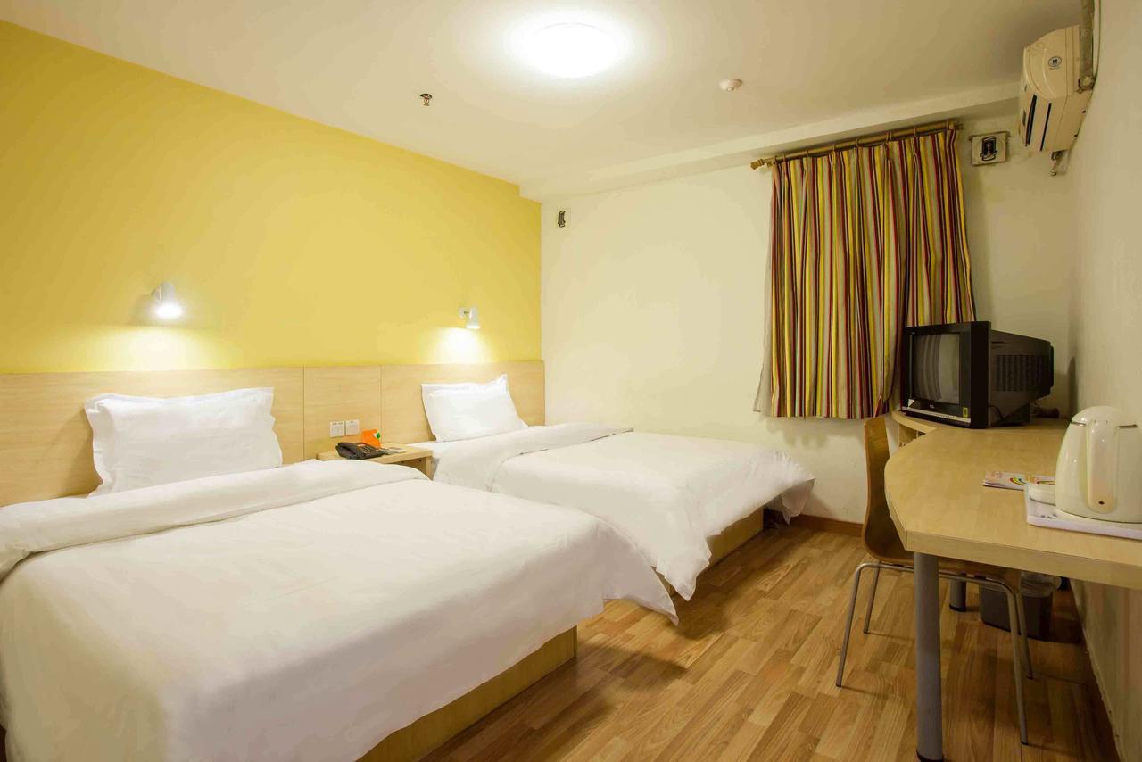 7 Days Inn Yangjiang Xinyue International Studio Kamer foto